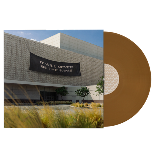 Brown vinyl record album with a building facade featuring a banner on its cover.