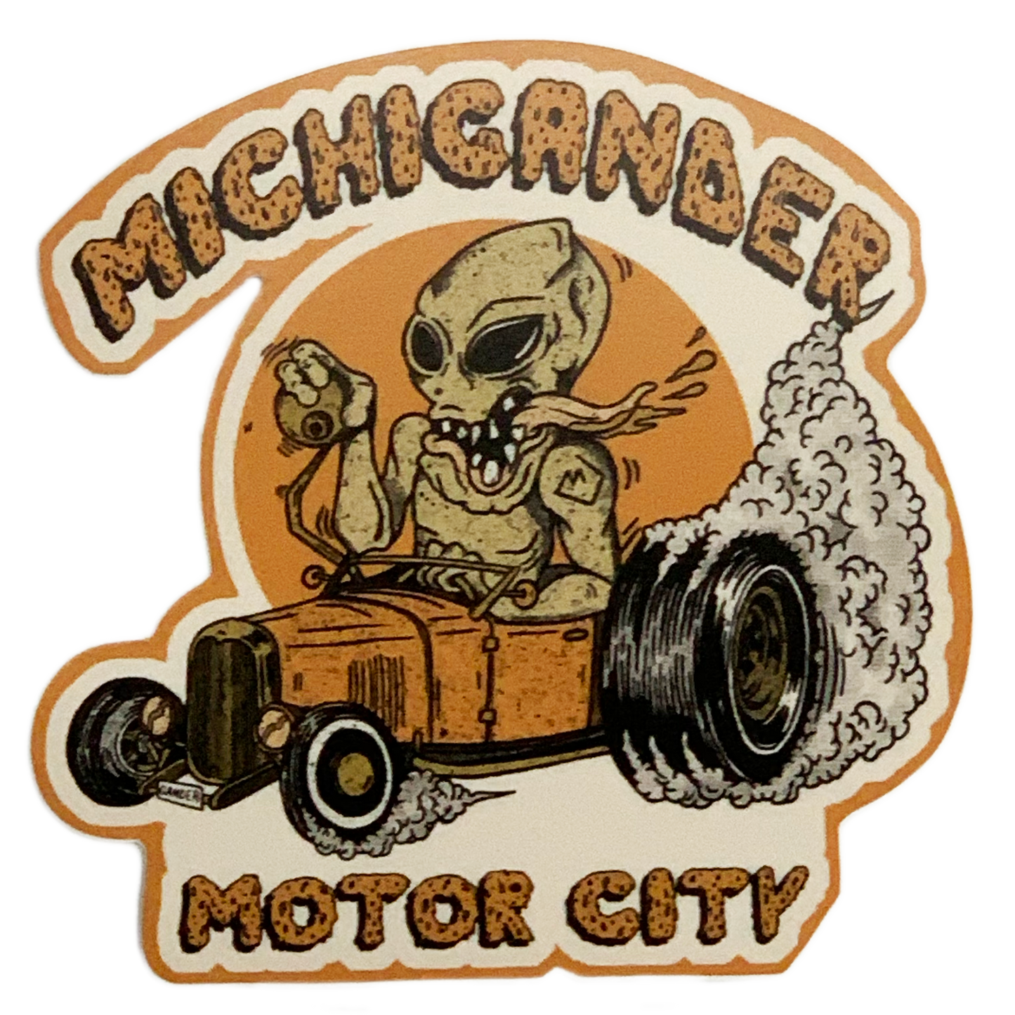 Retro-style sticker featuring an alien skeleton driving a hot rod with ’Michigander Motor City’ text.