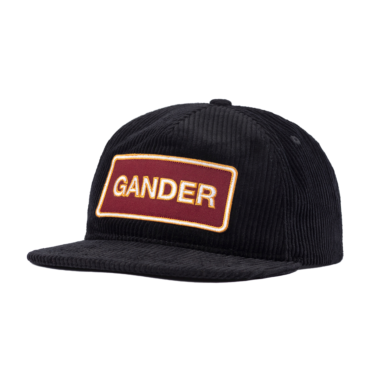 Black corduroy baseball cap with a rectangular ’GANDER’ patch on the front.