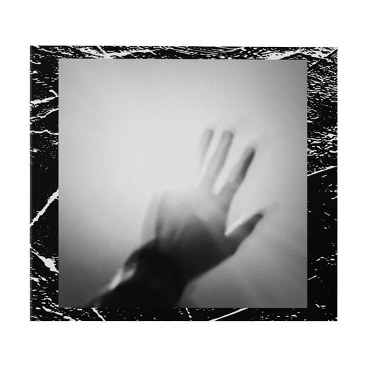 Shadowy silhouette of an outstretched hand against a blurry background.