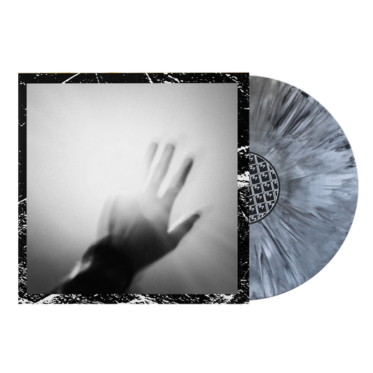 Vinyl record with album cover featuring a shadowy hand silhouette.